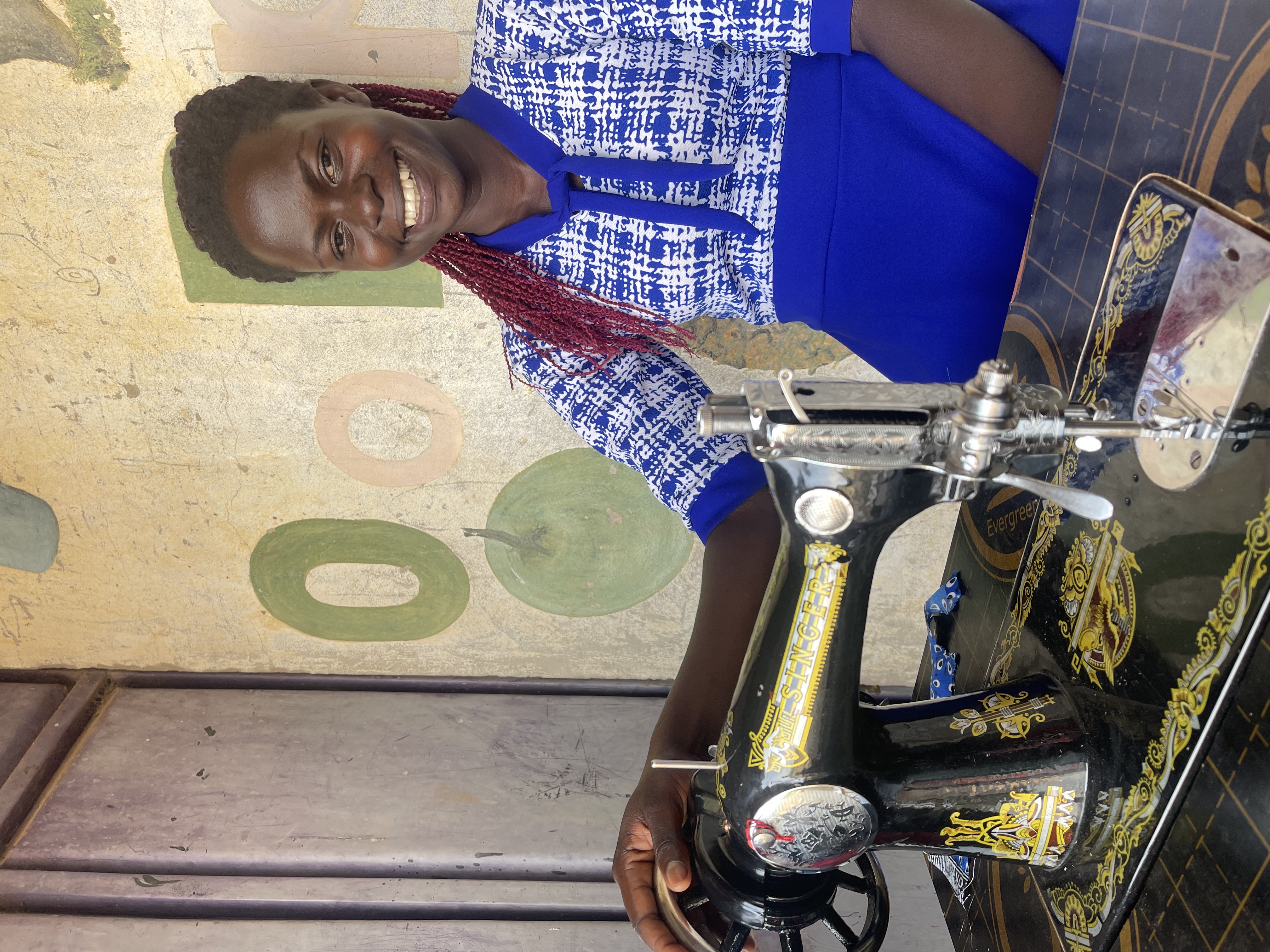 Sharon Akello’s journey: Sewing a New Future for Her Family